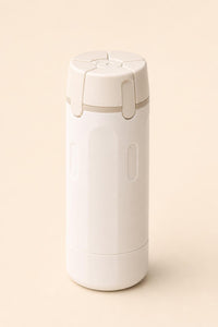 Dispensador Cleanvok 4 en 1 blanco crema, centrado, fondo crema